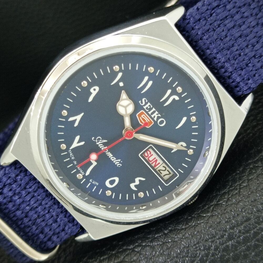 Vintage 1975 Seiko Automatic Mens Silver Watch W/daydate & Blue accents